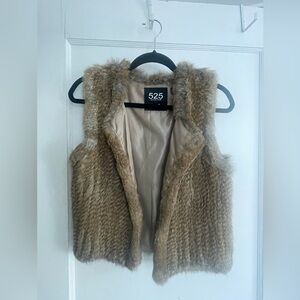 525 rabbit fur vest. Never been worn.